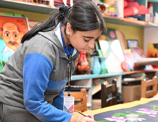 Teacher and student at K.R. Mangalam World School Indirapuram